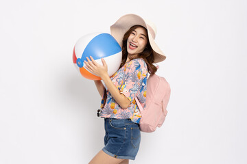 Happy Young Asian traveler woman wearing floral dress smiling with backpack and holding beach ball isolated on white background, Tourist in summer and holidays vacation concept - 774191406