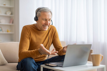 Man in headphones in a video conference call