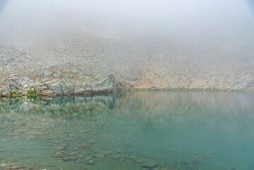 uludag glacial lake trekking and camping point reflection of the lake fog cloudy sky wonderful...