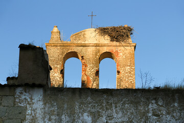 Stork nest on remains of antique church in Merida - obrazy, fototapety, plakaty