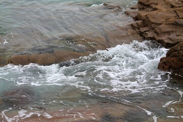 water flowing over rocks