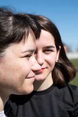 Fototapeta premium Close up portrait of a two young women