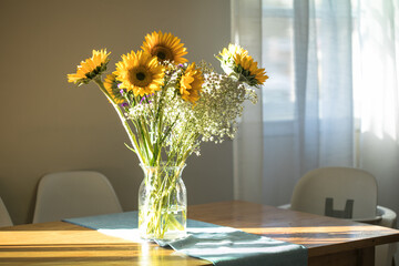 bouquet of flowers on a table in a living room