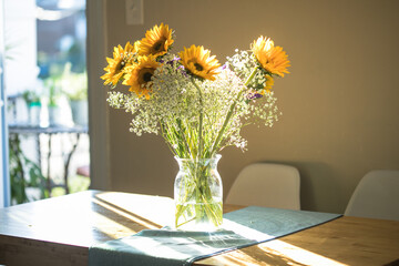 bouquet of flowers on a table in a living room