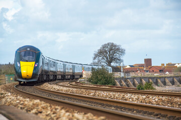 A train on a curving track. Transport and railway infrastructure. Good leading lines. Transport and...