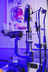 A modern microscope for vision testing in a light room. Microscope for vision correction.