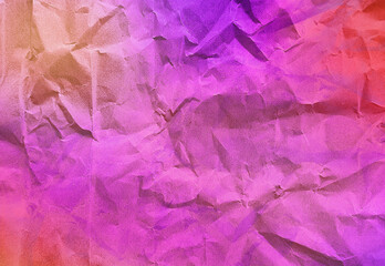 close up texture of gradient neon purple, red, pink crumpled or torn craft paper use as background with blank space for design. abstract creased recycle neon paper texture for fantasy concept.