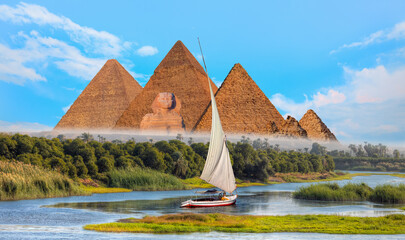 Beautiful Nile scenery with traditional Felluca sailing boat in the Nile on the way to Giza...