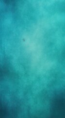 Fototapeta na wymiar Cyan grainy background with thin barely noticeable abstract blurred color gradient noise texture banner pattern with copy space 