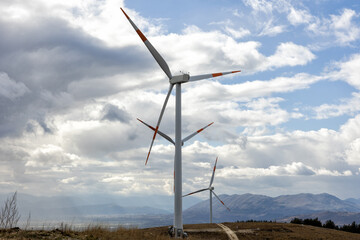 Stunning view in nature of turbines in a wind farm or wind farm located in the mountains of Italy...