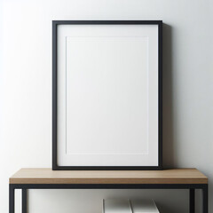 Thin black frame on the table, modern minimalist decor