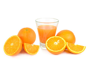Orange fruit and juice in a glass isolated on a white. There is free space for text.