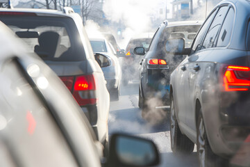 Air pollution with cars and smoke on highway. 