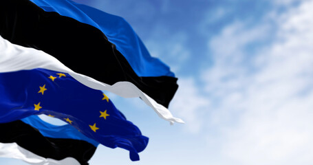 Close-up of Estonia and the European Union flags waving on a clear day - 774286250