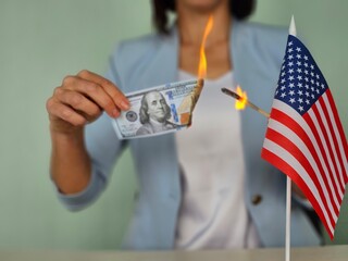 Metaphor of the crisis of burning dollars. Economic crisis in the USA