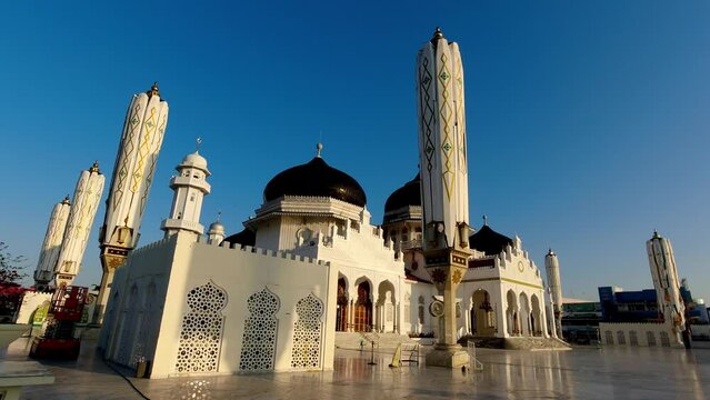 Baiturrahman Grand Mosque at the morning. Masjid Raya Baiturrahman for muslim prayer located in Banda Aceh, Indonesia. Popular tourist destination