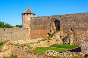 Ivangorod fortress in Ivangorod, Leningrad Oblast, Russia. Located on the Narva River along the Russian border with Estonia - obrazy, fototapety, plakaty