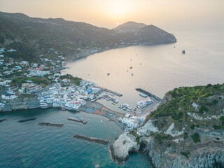 Aerial view of sunrise at Borgo Sant'Angelo in Ischia in the municipality of Serrana Fontana.A fishing village in an island in Naples - obrazy, fototapety, plakaty