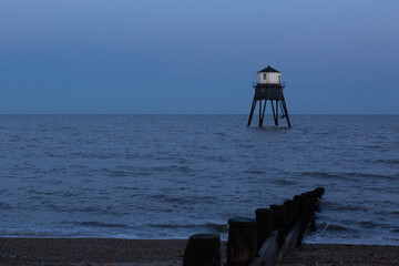 Lighthouse in the sea, Dovercourt low lighthouse at high tide built in 1863 and discontinued in...