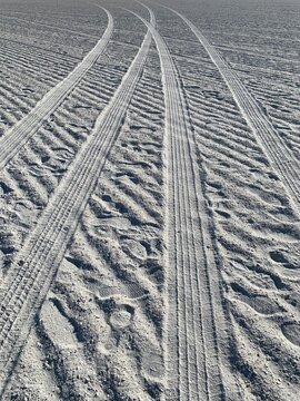 tire tracks drive in beach sand pattern