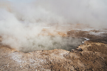 Shot of hot water pond in Tatio geysers in the Atacama desert, Chile