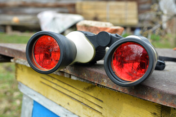 binoculars with red lens