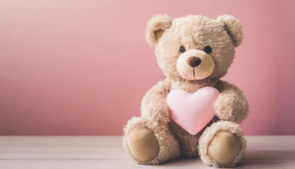 Smiling teddy bear holding pastel pink soft heart and pastel pink background. copy space for your text