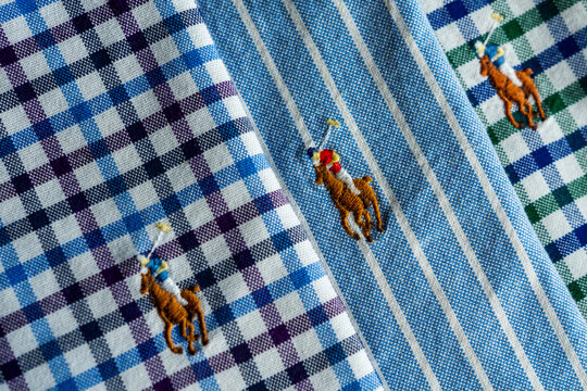 3 colorful close up stitched ralph lauren logo on shirts