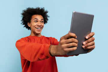 Man taking a selfie with tablet