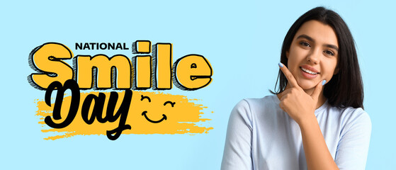 Smiling young woman with healthy teeth on blue background