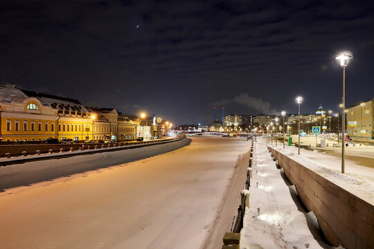 Russia. Moscow in winter. Ice-bound Vodootvodny Canal. On the left is Kadashevskaya Embankment, on the right is Bolotnaya Street