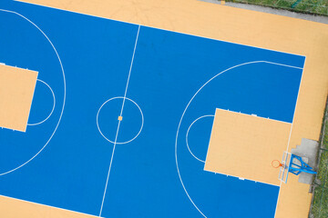 High angle view of the blue and yellow basketball court