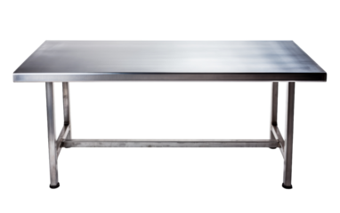 A gleaming stainless steel table stands alone on a pristine white background