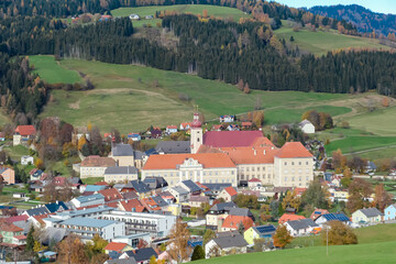 Benedictine monastery Saint Lambrecht Abbey surrounded by lush green alpine landscape in nature...