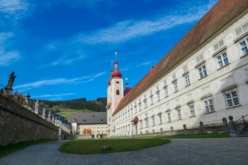 Benedictine monastery Saint Lambrecht Abbey surrounded by lush green alpine landscape in nature...