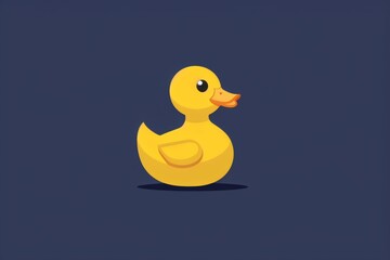 A cheerful yellow rubber duck sits on a dark surface, a nostalgic toy icon in a minimalist setting.