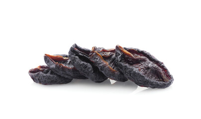 Dried prunes in a row isolated on white background. Healthy snack.
