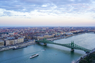 Danube river with Liberty bridge or Freedom bridge in Budapest, embankment with city panorama