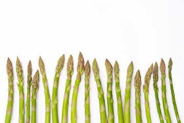 Fresh green asparagus on the white background