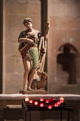 Religious statue in the basilica of the town of Carcassonne in the south of France - obrazy, fototapety, plakaty