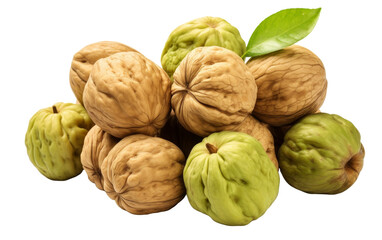 Obraz premium A bunch of walnuts stacked with a vibrant green leaf on top