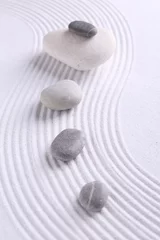 Fototapeten Zen garden stones on white sand with pattern © New Africa