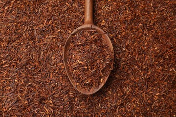 Rooibos tea and wooden spoon, top view