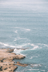 waves crashing on the rocks