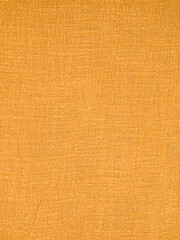 Beige burlap fabric as a background with a fold.