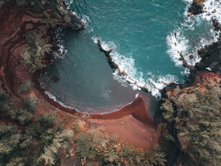 Red sand beach from above in Hawaii