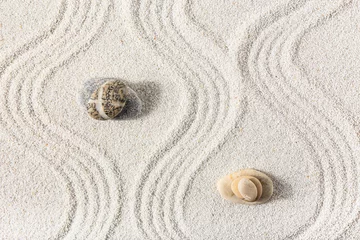 Tuinposter Stones on sand with lines in Japanese rock garden.  Zen concept © Pixel-Shot
