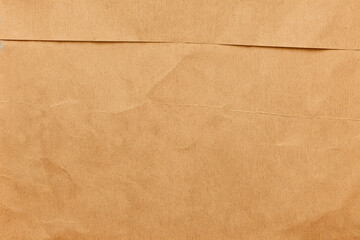 Beige recycled craft paper texture as background.