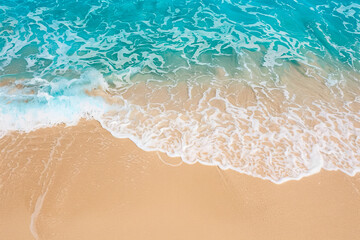 Fototapeta na wymiar Aerial top view on nature landscape view of beautiful tropical clean sandy beach and soft blue ocean. Aerial top-down view.