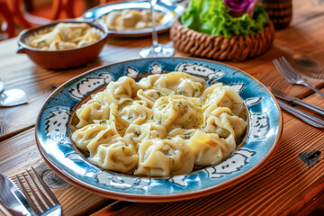 A hearty plate of steaming dumplings is served on a patterned plate, inviting a taste of tradition.